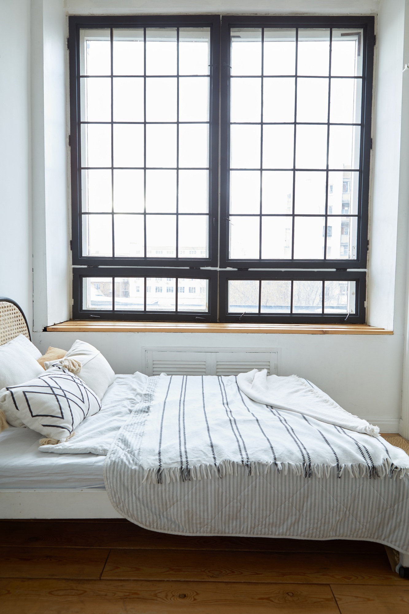 Light bedroom in modern apartment in minimal style
