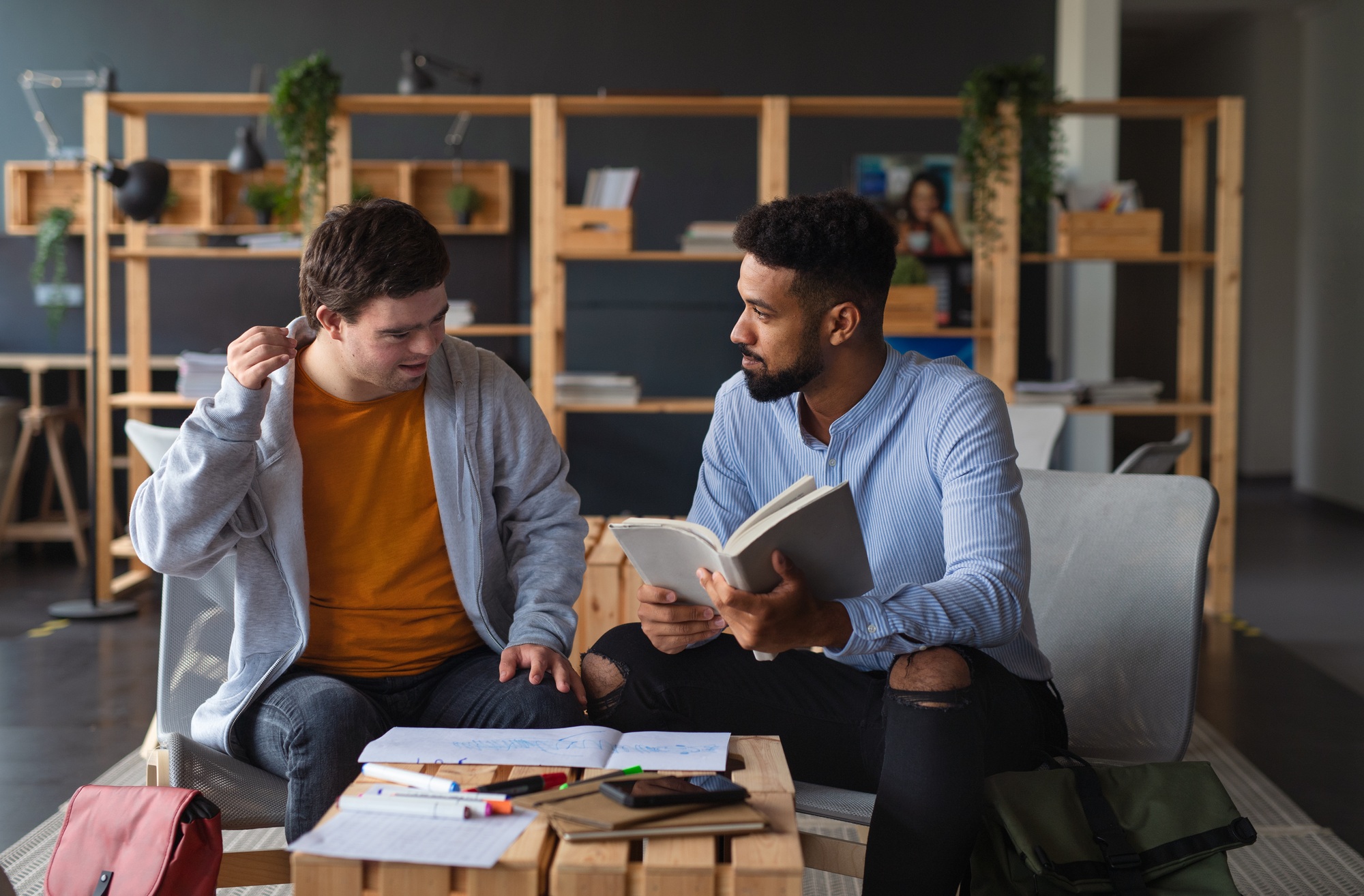 Support worker mentoring young man with disability—highlighting Adonai Care’s disability support services Perth.